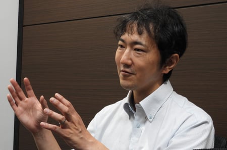 日経サステナブルリンクのインタビューに応える高橋大祐氏氏